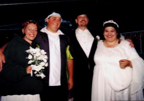 trinity caught the bouquet, and joe was pushed into the garter!